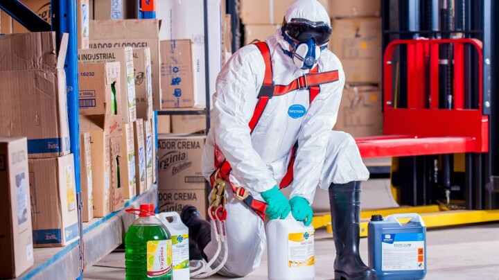 Control of Substances Hazardous to Health (CoSHH) - Man in Hazmat suit working with chemicals